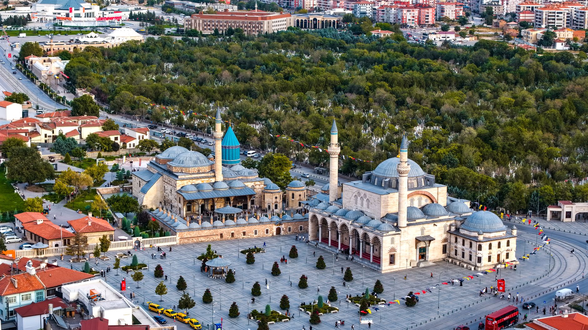 Vibrant aerial view of the iconic Mevlana Museum located in Konya, Türkiye, surrounded by lush greenery. — How to Use Analyti