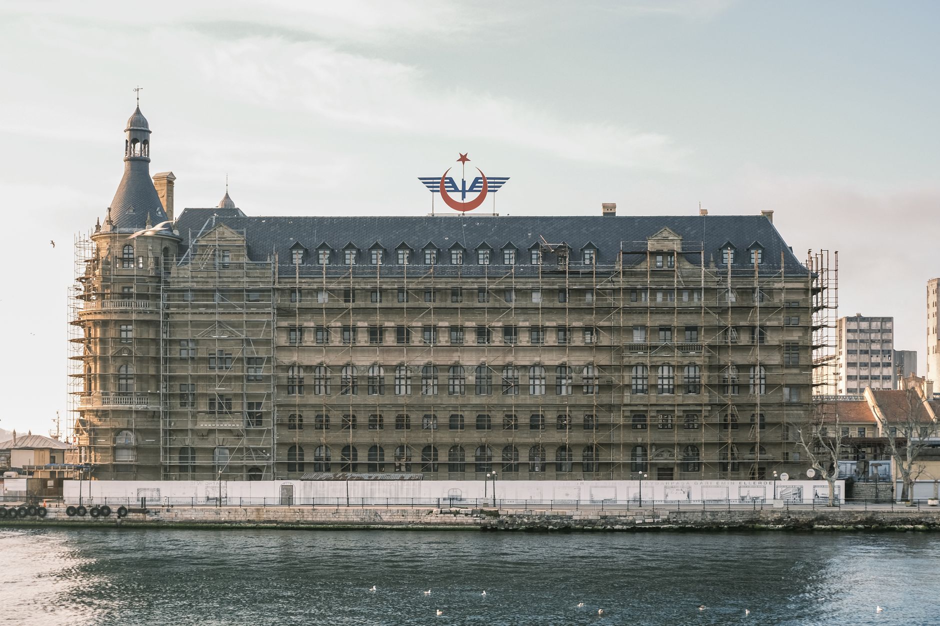 Scaffolding on a historic waterfront building under renovation. — Is the 82 Lottery App Safe and Legal in India?