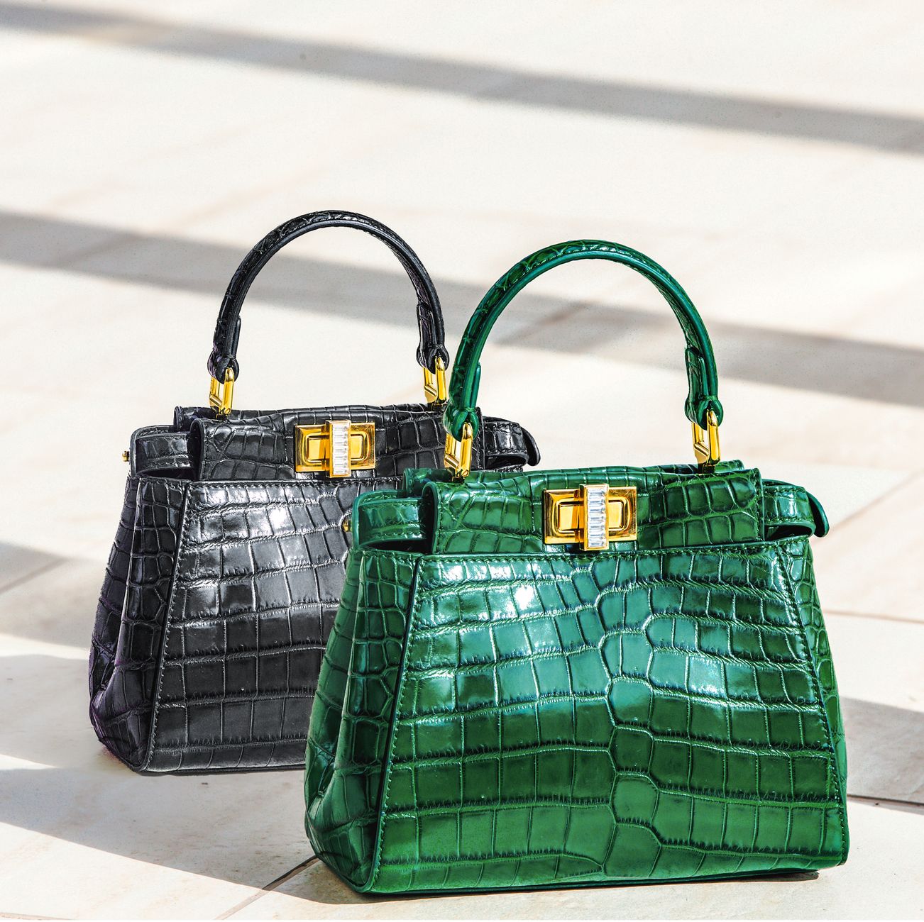Elevate your style with these exquisite green and black crocodile pattern handbags, perfect for a luxury fashion statement. —